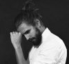 A-male-model-with-man-bun-and-beard-style.jpg