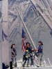 9.11 Firemen raising flag.jpg