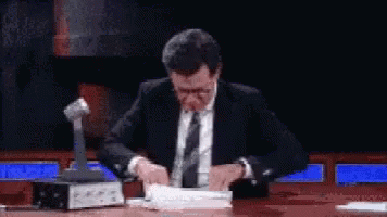 stephen-colbert-cant-find-it.gif