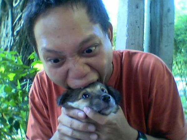 man_eating_dog_by_caisaki.jpg