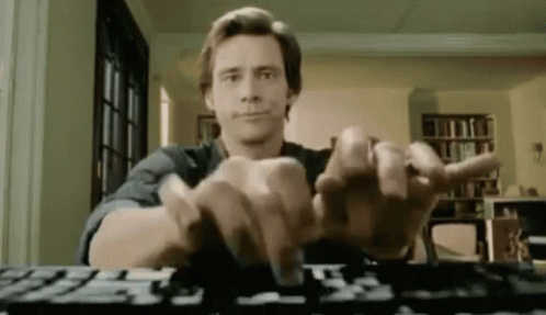 jim-carrey-fast-typing.gif