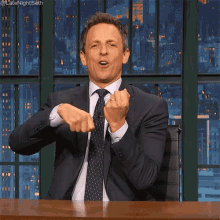 seth-meyers-middle-finger.gif