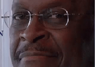 herman-cain-smile.gif
