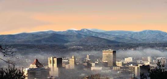 Winter view of Asheville, NC downtown and the surrounding Blue Ridge  mountain ridges with snow. | North carolina mountains, Mountain city, Blue  ridge mountains